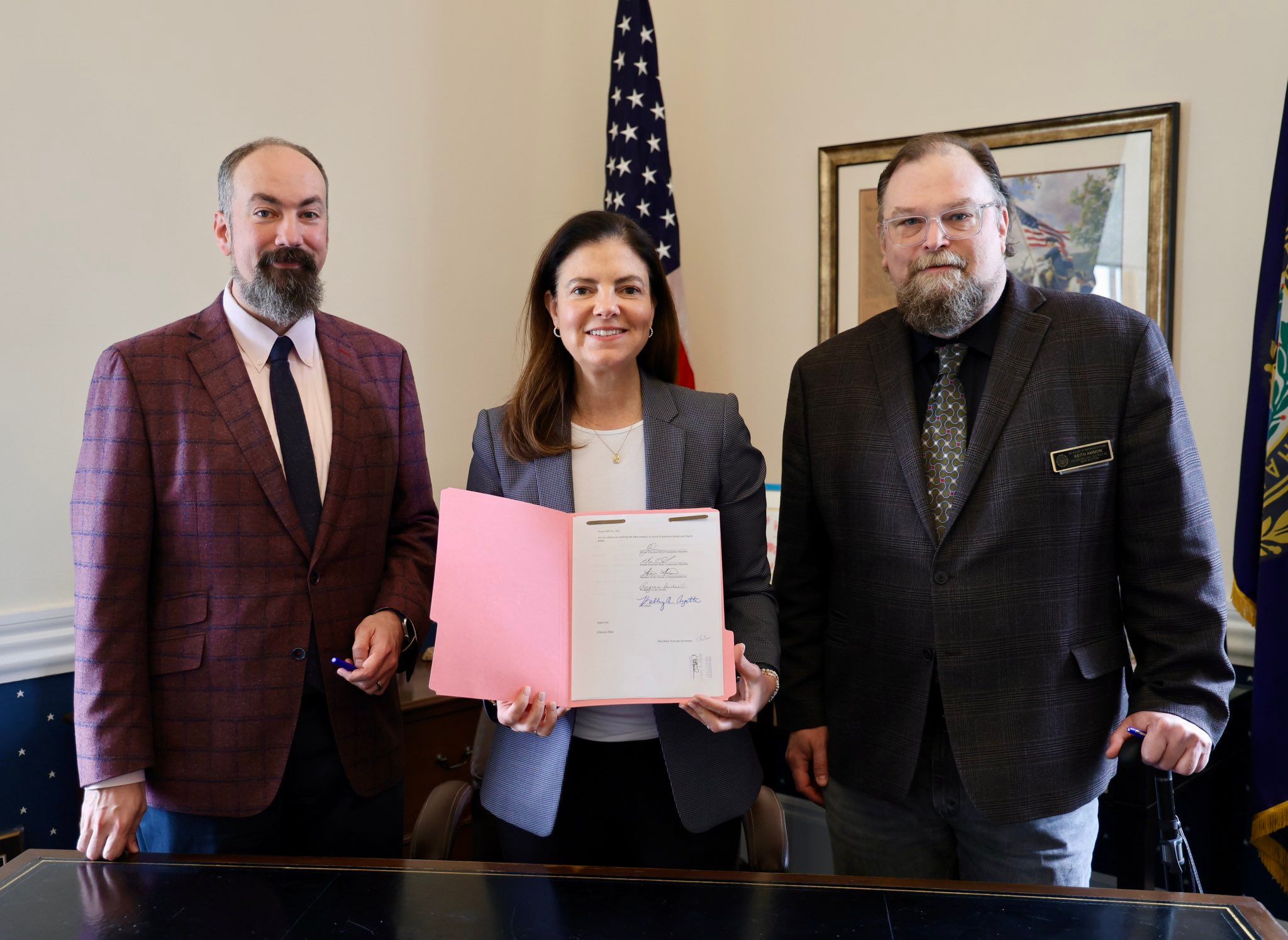 Governor Kelly Ayotte with signed House Bill 302